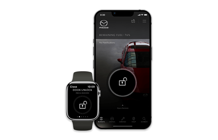 Smartphone and smartwatch display MyMazda app screen with unlock button. 