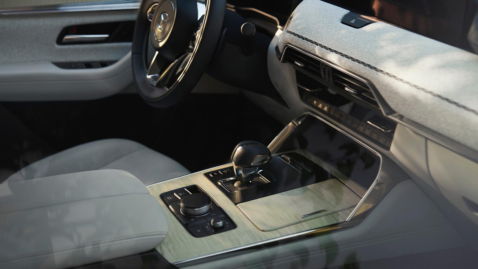 Close up of front interior showing the center console and dashboard.