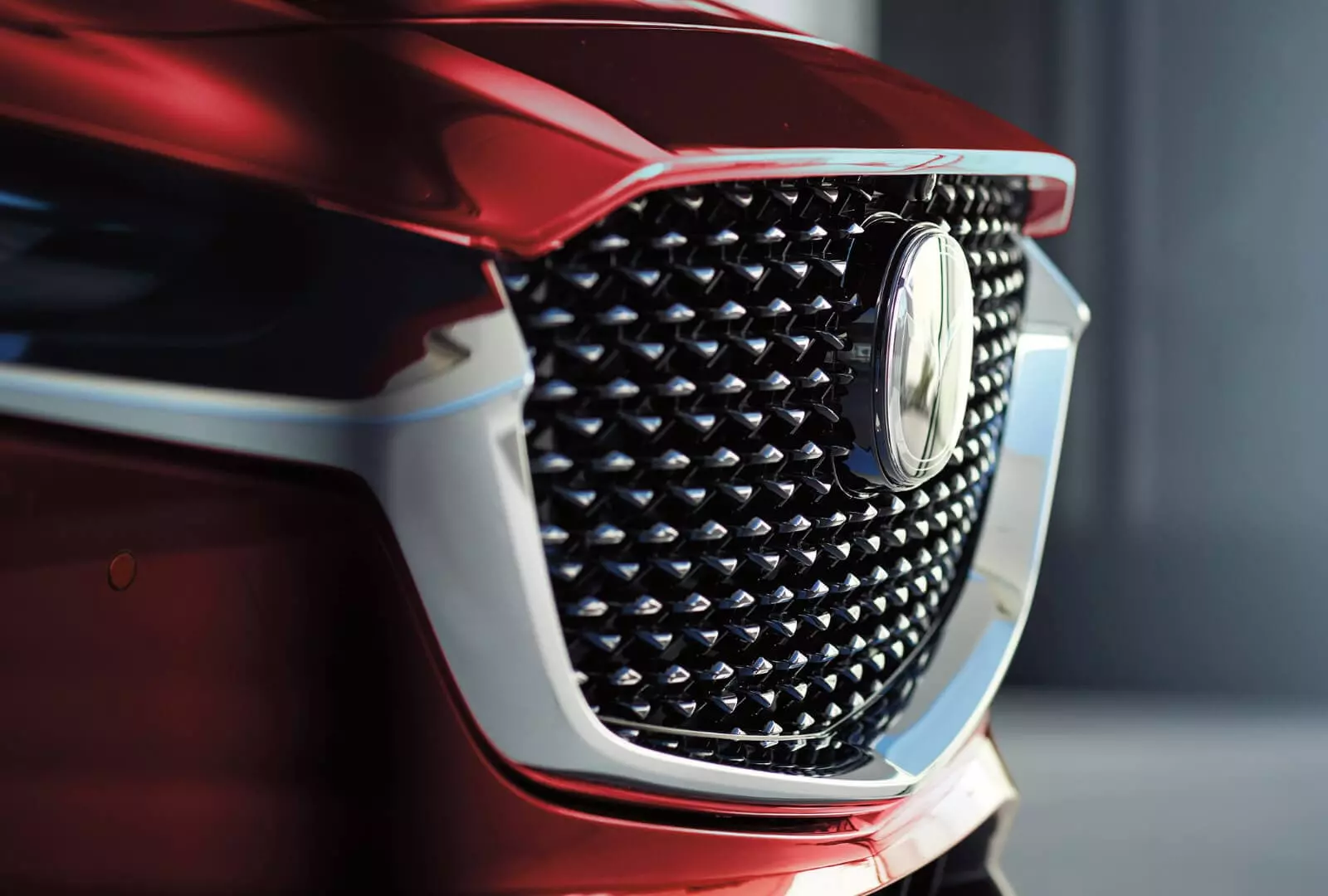 Front grille of a Mazda vehicle.