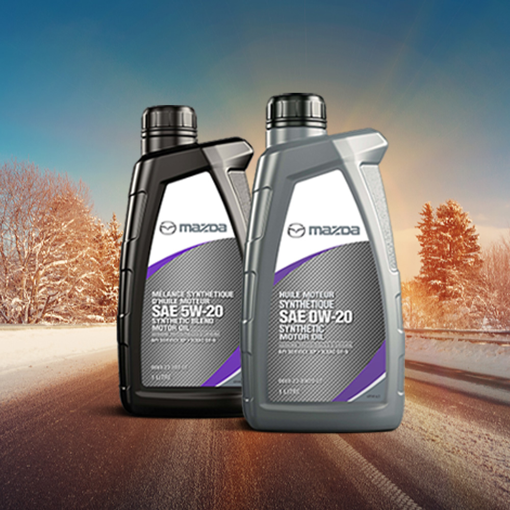  Winter landscape and two bottles of Mazda Genuine Synthetic Engine Oil