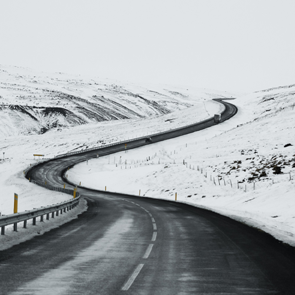  A winding road through snow covered hills