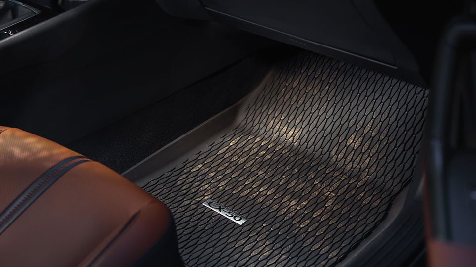 A close up of a floor mat inside a vehicle