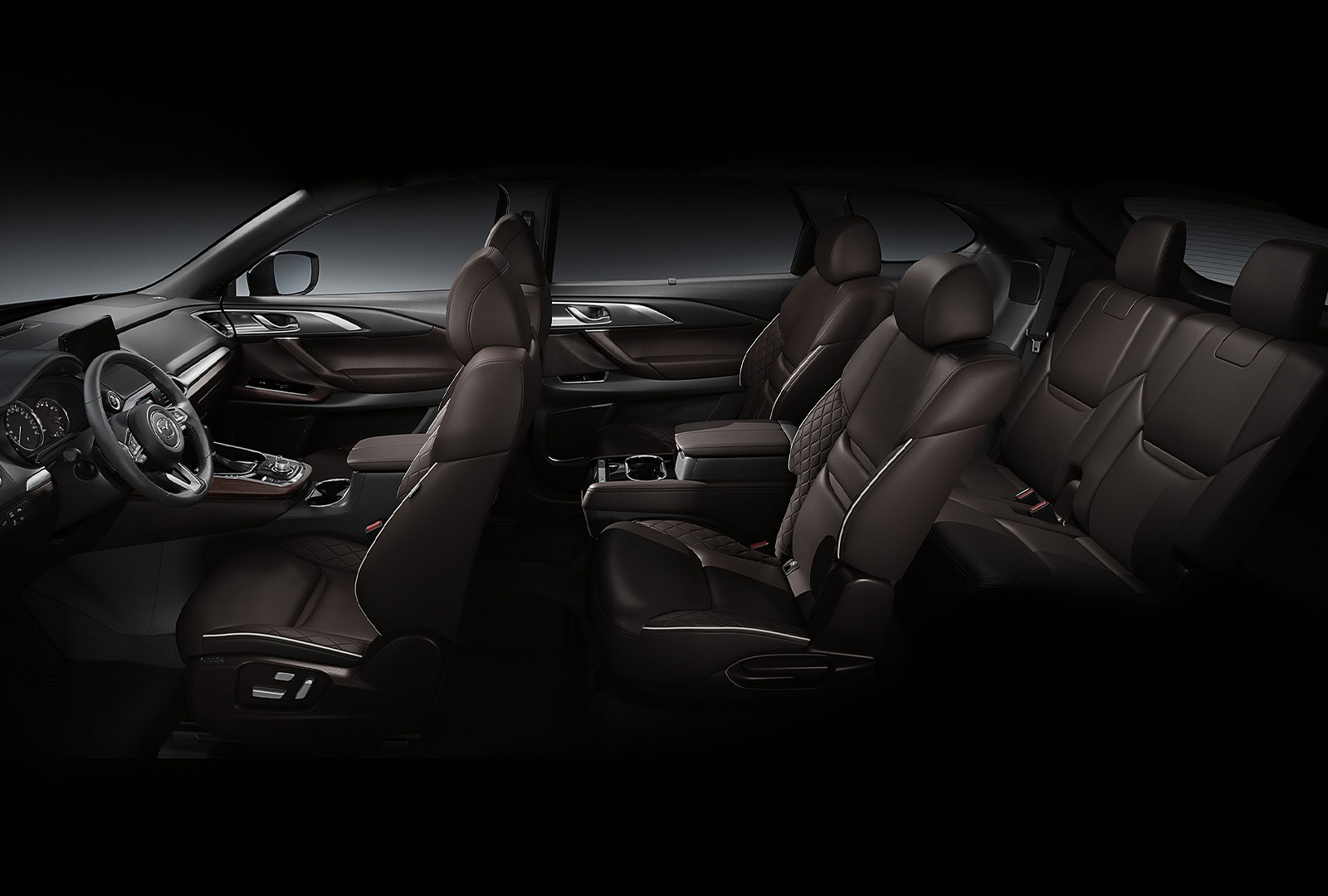 Driver side view of CX-9's interior 3-row seating.