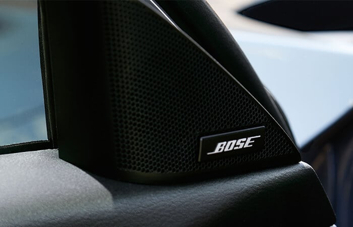 Close-up of driver-side neodymium tweeter with Bose logo.