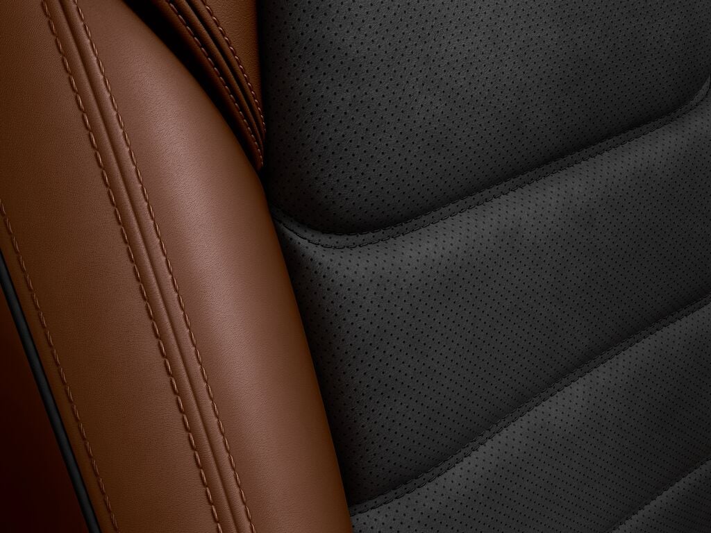 Close up of Terracotta/Black Leather seating textures.