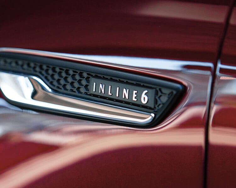 Closeup of Inline 6 Turbo Vehicle badge.  