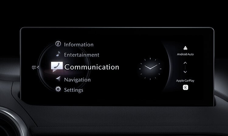 Closeup of digital centre display selecting “Communication” from a menu of control options. 