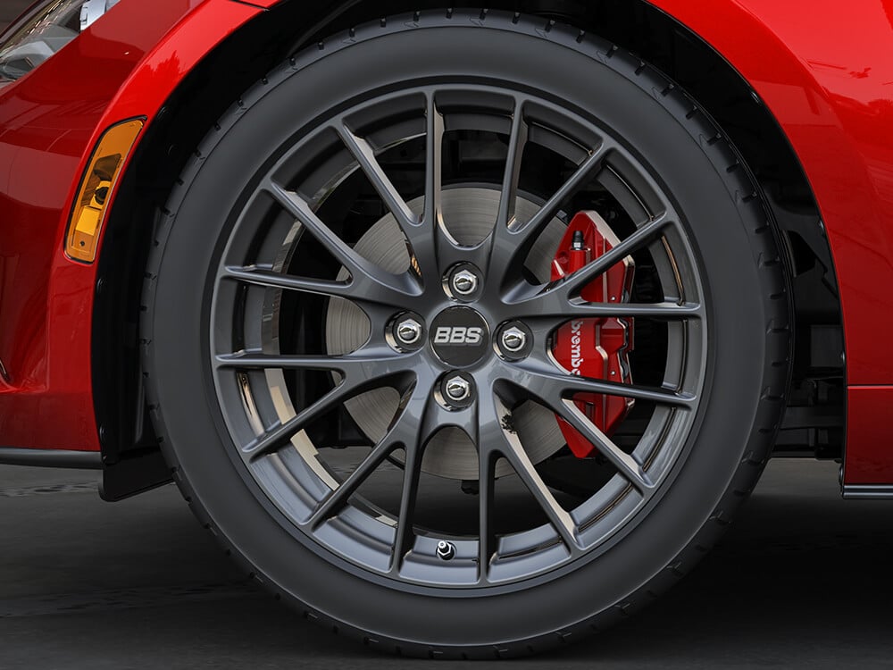 17-inch BBS® forged wheels (gunmetal finish) with red painted front and rear brake calipers.