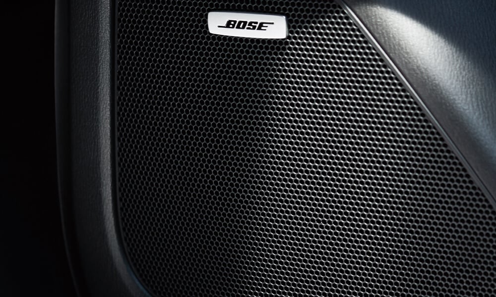 Close-up of Bose speaker in Mazda CX-5 interior.