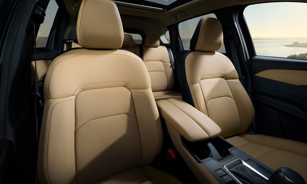 Looking into the Mazda CX-5 from the front passenger side, showing the front seats.